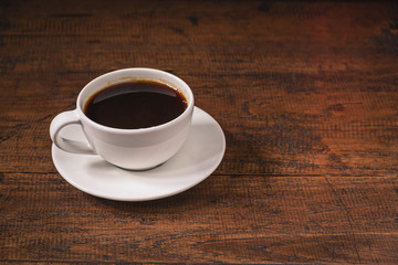 .Coffee cup on a wooden table