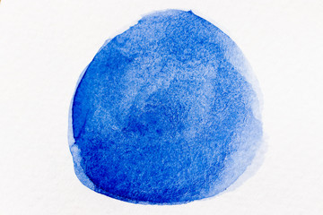 Blue color watercolor drawing round brush or banner in shape on white paper background