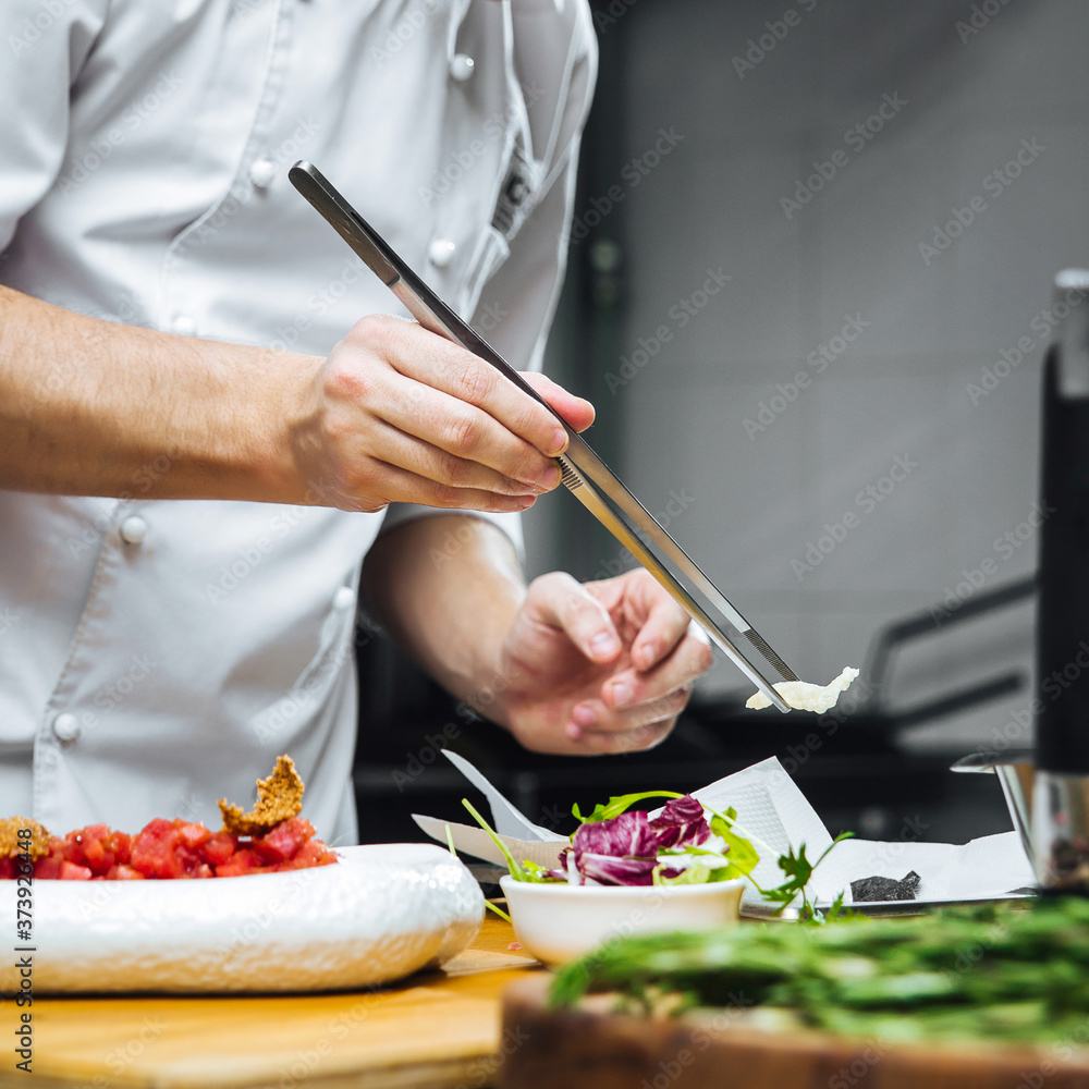 Sticker Restaurant chef cooking beef tenderloin carpaccio 