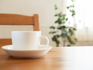 Fototapeta na wymiar テーブルの上のカップ