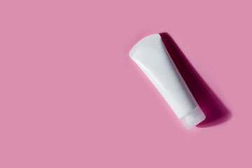 Empty mockup white plastic bottle with shadows.