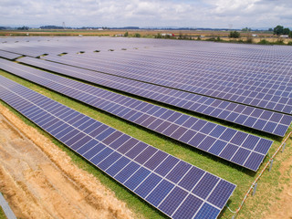 Solar Panel Array in a Grass Field 