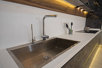 Fototapeta na wymiar Modern kitchen design in a luxury apartment