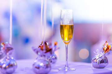Champagne glasses on the table at a party in the banquet hall.