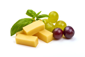 Diced holland cheese with green and red grape, isolated on white background
