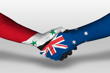 Handshake between Australia and Syria flags painted on hands, illustration with clipping path.