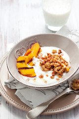 muesli,yogurt and grilled peaches