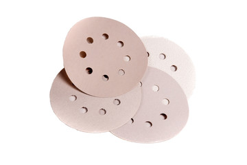 Circular sandpaper discs for grinding machine with different grain types isolated on a white background.