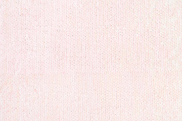 Tender abstract sequins background in pastel pink. Holiday backdrop for your design. Holiday banner design. Abstract wallpaper.