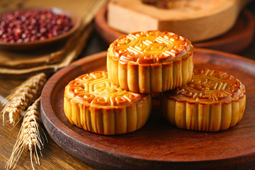 Chinese traditional mid autumn festival moon cake in wooden plate