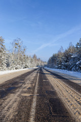 Obraz na płótnie Canvas snow-covered winter road