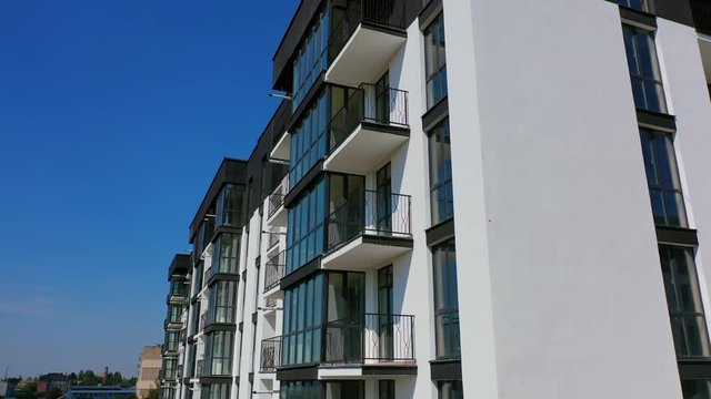 New apartment house. Detailed video on balconies of freshly built high-rise buildings. Dron video.