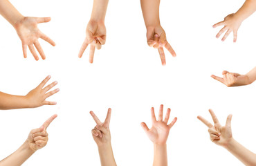 Pointing in center. Kids hands gesturing isolated on white studio background, copyspace for ad. Crowd of kids gesturing. Concept of childhood, education, preschool and school time. Signs and senses.