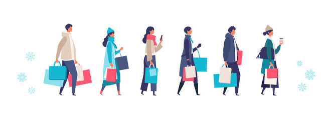 Some people carrying shopping bags at winter. Man and woman taking part in seasonal sale at store, shop, mall.