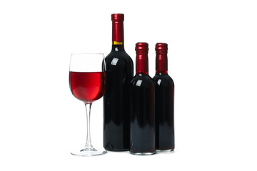Bottles and glass of wine isolated on white background