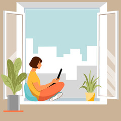 The girl is reading a book, sitting on the sill of an open window .