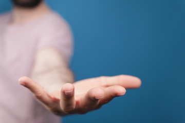 A man without head holding something without theme.