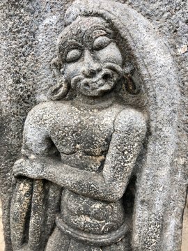 Bas relief sculpture of an aged man carved in the walls of Shiva temple at Tamil nadu