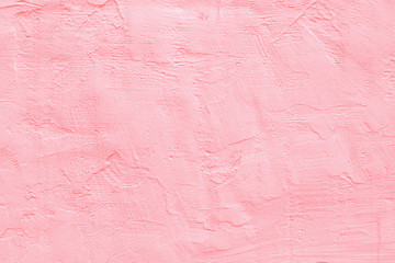 Pale pink concrete wall.