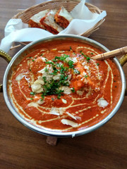 Delicious Indian curry food decorated on a restaurant table.
