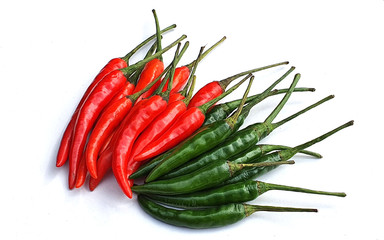 Red and green fresh chillies on white background.