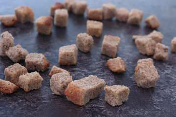 Crab croutons on a wooden table. Snack food to beer