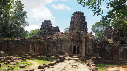 Fototapeta premium Throwback trip in Cambodia Siem Reap. Cambodia Siem Reap－July 25, 2016: Ancient architecture and natural scenery in Angkor Wat Cambodia. Photo taken in Pre Rup, East Mebon, Ta Som, Neak Pean, and Prah