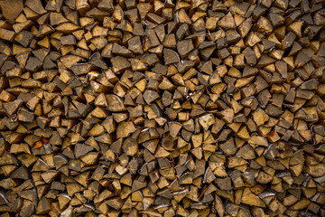 Pile of chopped firewood prepared for winter