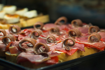 Obraz premium Tapas for sale in Madrid San Miguel market. Spain.