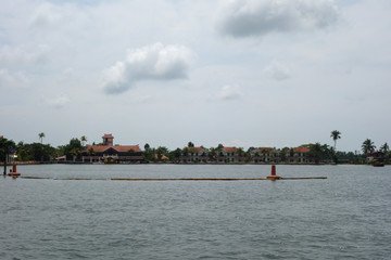 Fototapeta na wymiar Backwaters network of brackish lagoons in Kerala