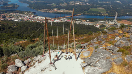Aerial view of the CerLove giant wooden swing in Vila Nova de Cerveira, Portugal. The swing of the...