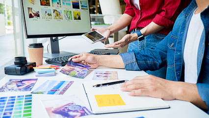 Advertising agency designer creative start-up team discussing ideas in office. 