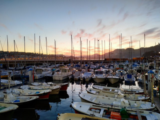 Magical summer sunset at the harbor in Donostia - San Sebastian