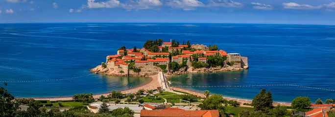 Fotobehang View of Sveti Stefan luxury resort island on the Adriatic sea coast, Montenegro © SvetlanaSF