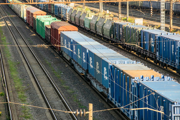 Locomotives at the railway station against the background of the city.