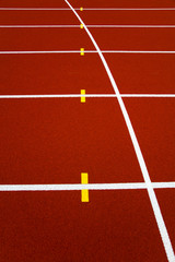 Red stadium running track closeup