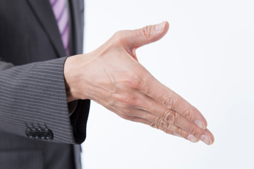 Obraz premium 握手するビジネスマン