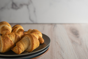 croissant on a wooden table