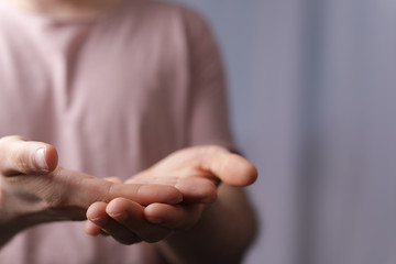 A man holding empty his hand