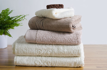 Fototapeta na wymiar Stack of clean pastel towels