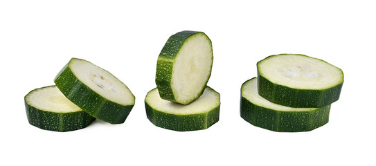 zucchini slices isolated on white