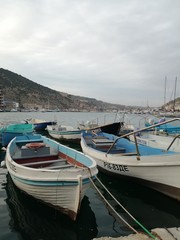 Fototapeta na wymiar boats on the beach in the Crimea, Balaclava