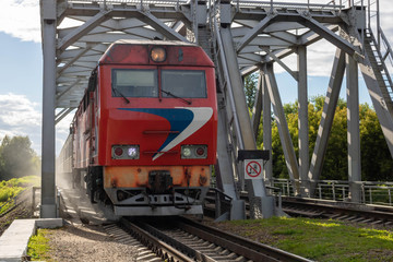 On the railway bridge is a locomotive
