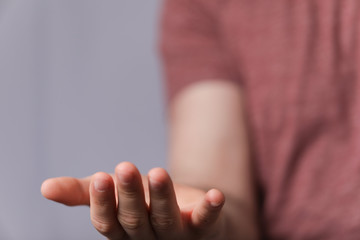 A man holding empty his hand