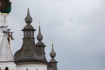 White brick old russian kremlin timber roofs fragment