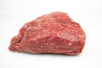 large piece of beef tenderloin, raw meat, isolated on white