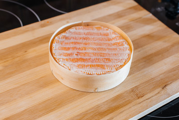 Delicious traditional German cheese close-up during cooking. To make a cheese