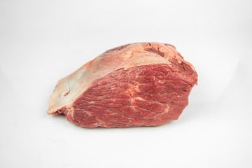 large piece of beef tenderloin, raw meat, isolated on white