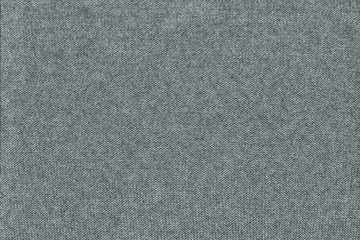 The texture of grey knitted knitwear on the wrong side. The inside out natural cotton Jersey.