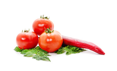 Ripe red tomatoes and pepper.